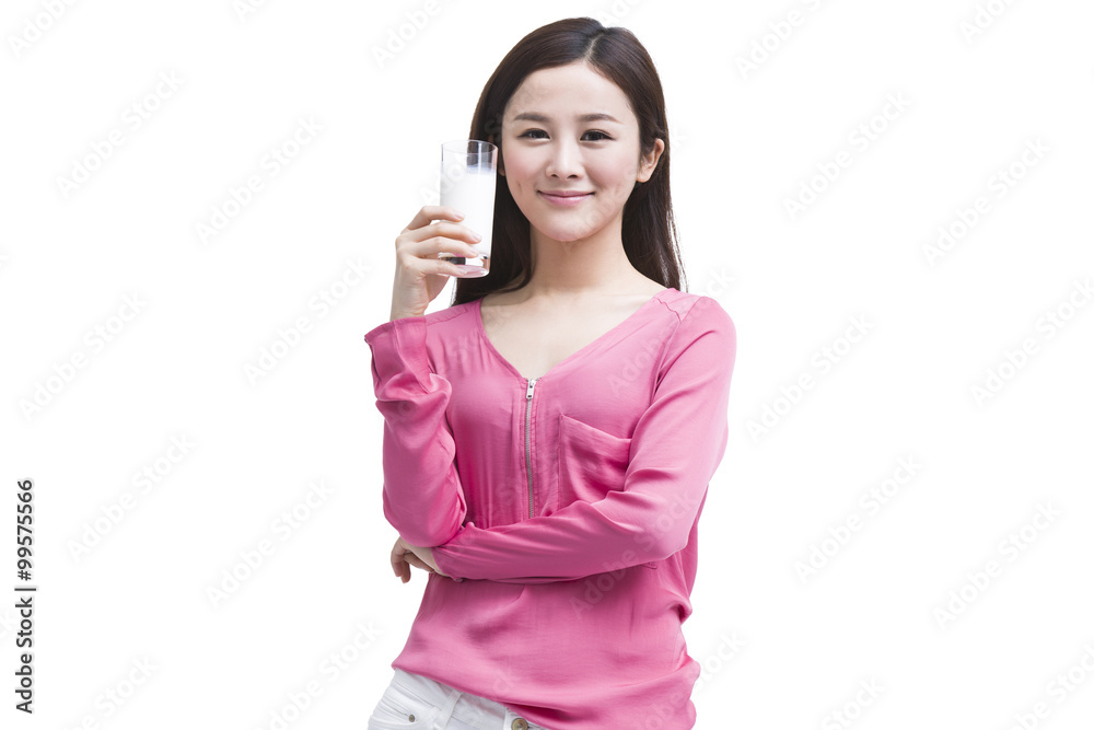 Fashionable young woman drinking milk Fashionable young woman drinking milk