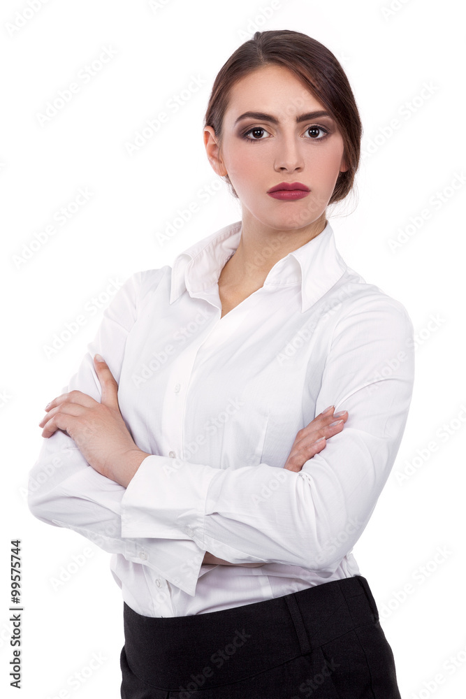 Attractive Confident businesswoman with her arms crossed - Stock Image Attractive Confident businesswoman with her arms crossed - Stock Image