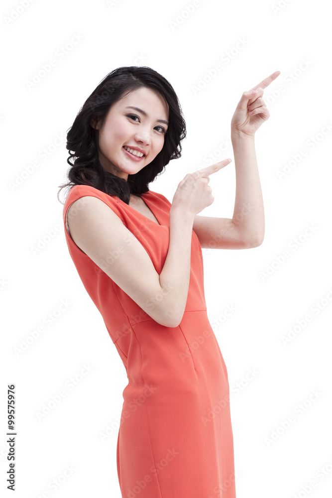Cheerful young woman pointing Cheerful young woman pointing