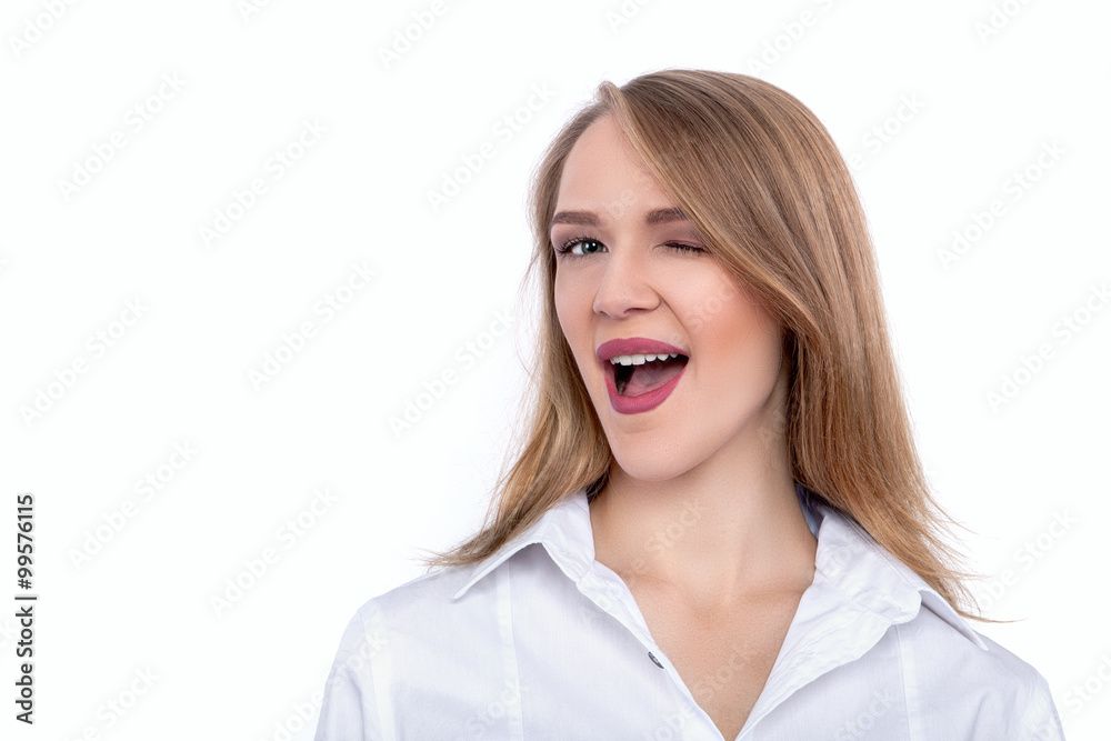 Winking Young Beautiful Woman isolated on white background - Stock Image Winking Young Beautiful Woman isolated on white background - Stock Image