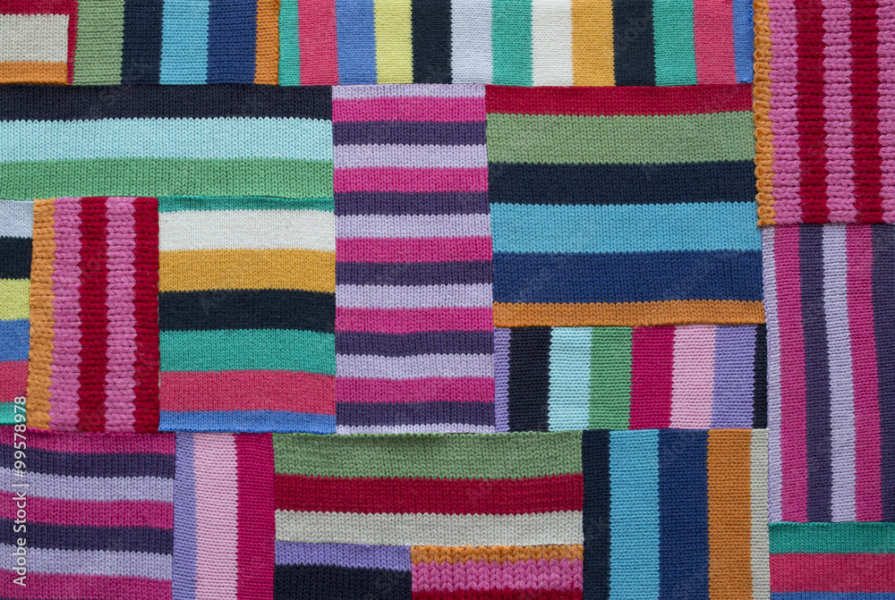 patchwork collage with pieces of striped knitted textile