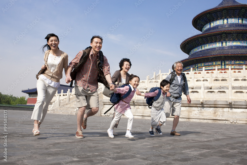 Happy family travelling at Temple of Heaven in Beijing, China Happy family travelling at Temple of Heaven in Beijing, China