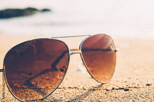 black sunglasses and sea background
