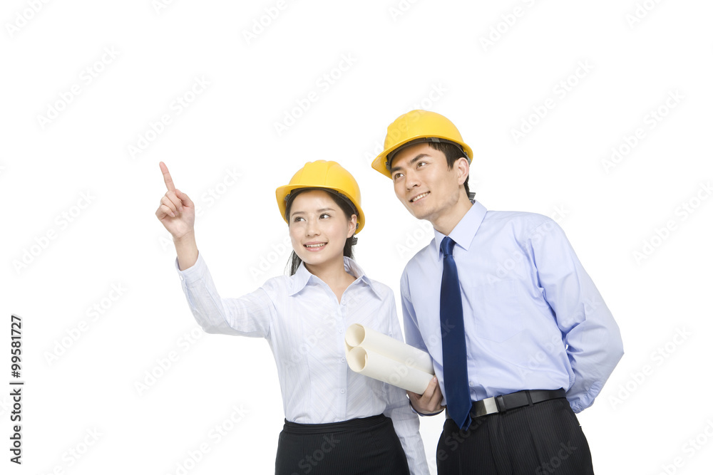 Construction managers in hard hats