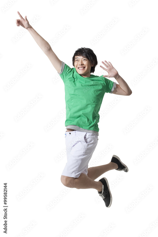 Young man jumping in mid-air