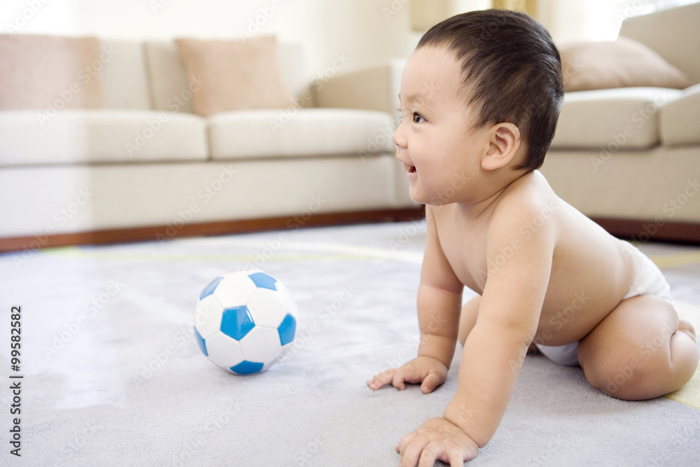 Infant with soccer ball