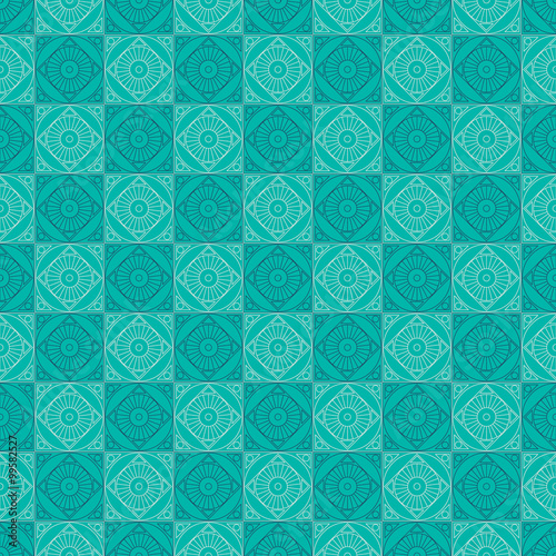 Seamless vector pattern. Symmetrical geometric background with squares on the blue backdrop. Decorative repeating ornament.
