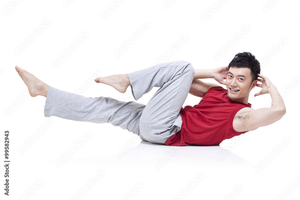 Fototapeta premium Young man doing yoga