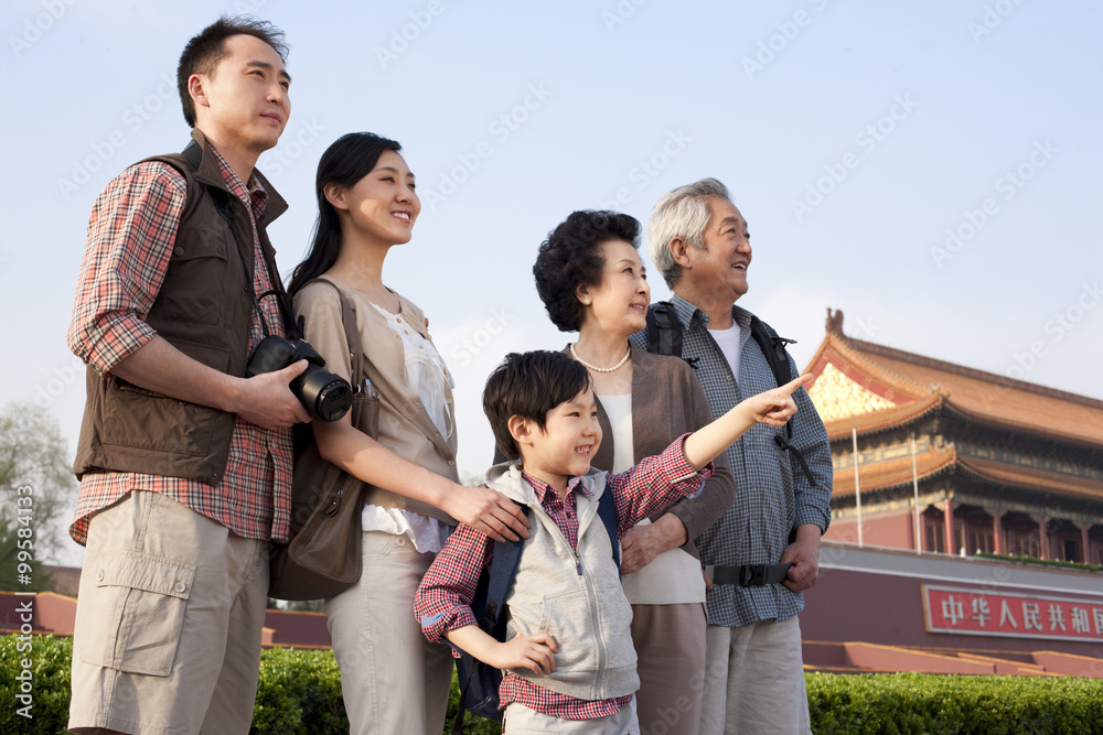 Happy family travelling at Tiananmen Square in Beijing, China Happy family travelling at Tiananmen Square in Beijing, China
