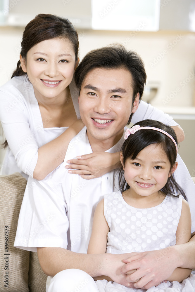 Portrait of a young family at home Portrait of a young family at home