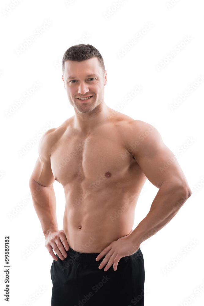 Happy Muscular Man Standing With Hands On Hip