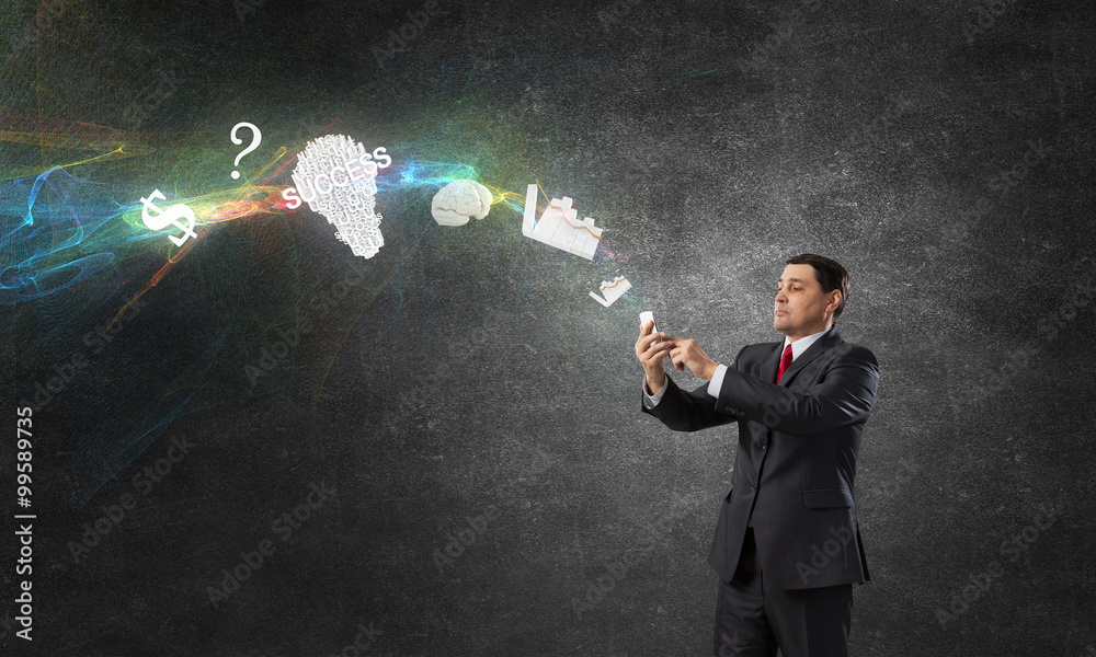 Businessman using mobile application Businessman using mobile application