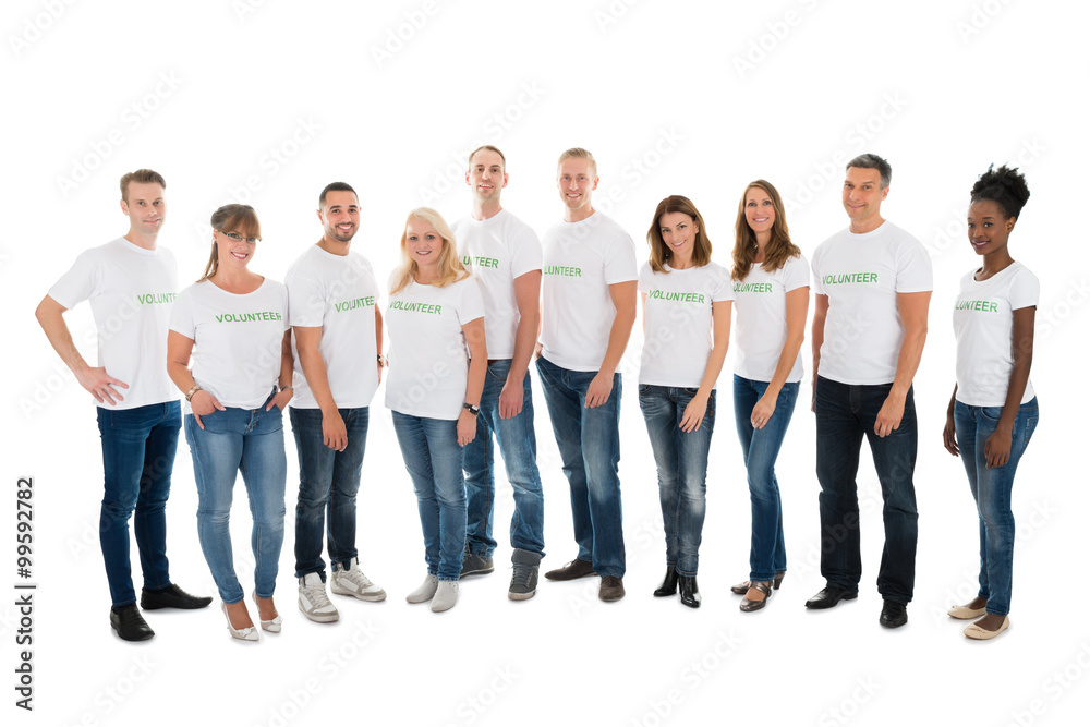 Portrait Of Confident Volunteers Standing In Row Portrait Of Confident Volunteers Standing In Row