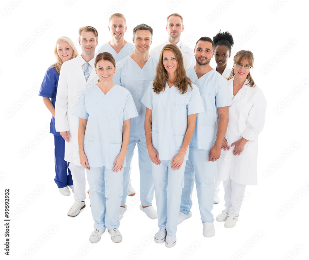 Happy Medical Team Standing Against White Background Happy Medical Team Standing Against White Background
