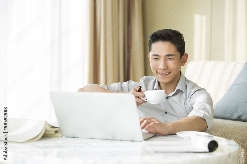 Young man working at home Young man working at home