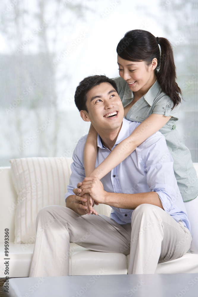 Portrait of a couple relaxing on the couch Portrait of a couple relaxing on the couch