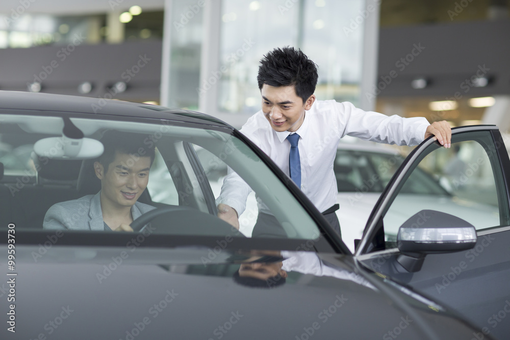 Young man taking a test drive