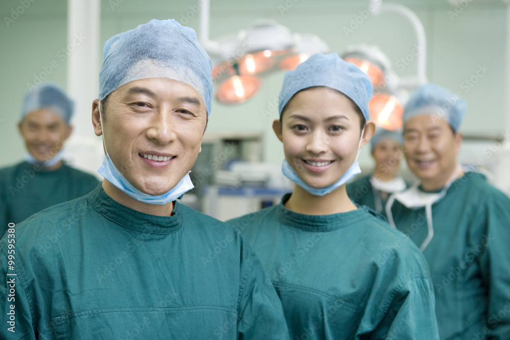 Portrait of a group of happy surgeons