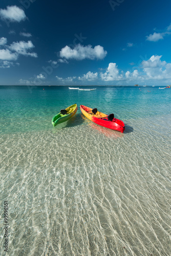 Colored Kayaks in a caribbean sea