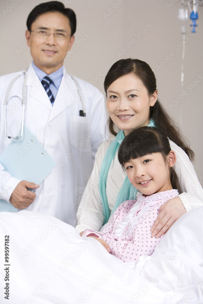 Obraz premium Portrait of a girl, her mother, and her doctor