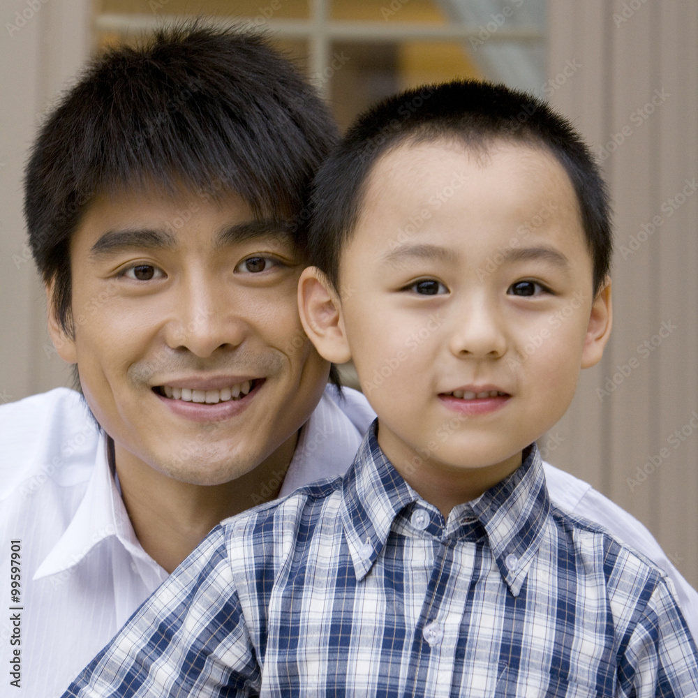 Portrait of father and son