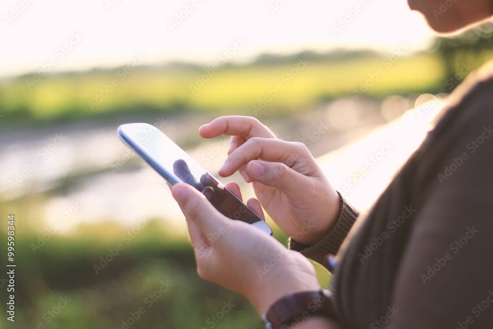 woman hands holding smartphone.
