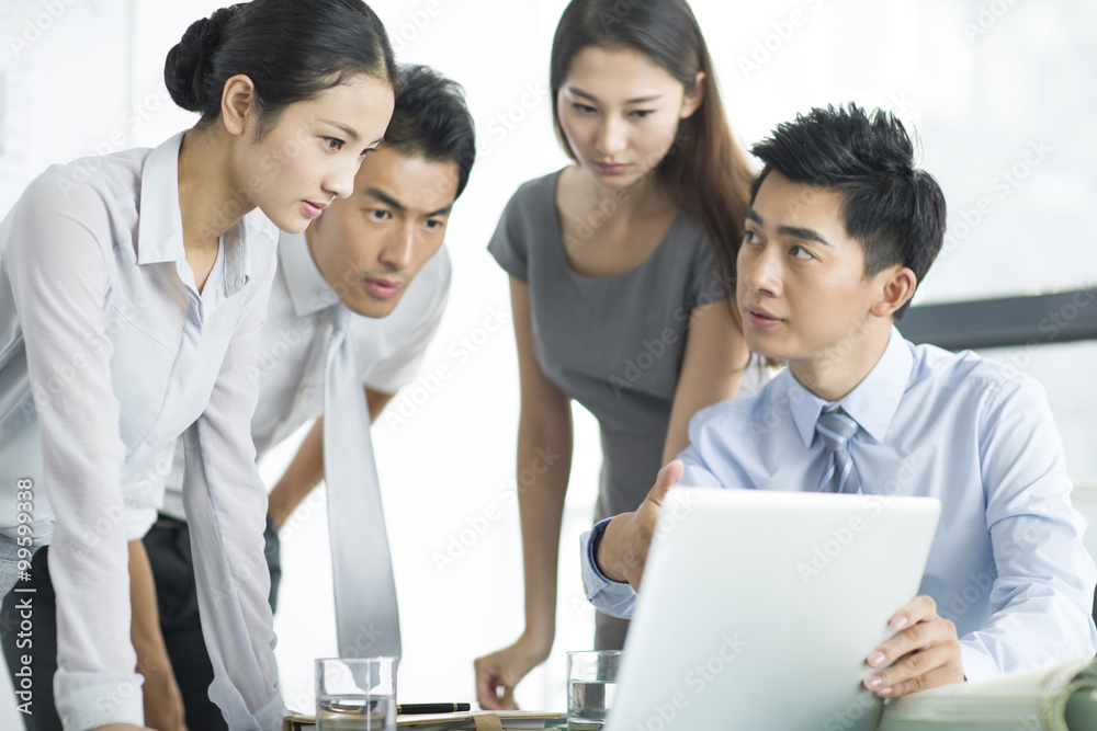 Young business people talking in meeting Young business people talking in meeting