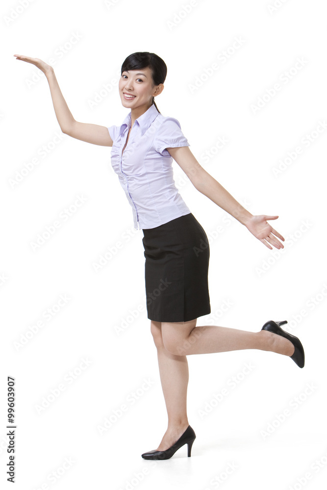 Confident Businesswoman Standing on One Leg Confident Businesswoman Standing on One Leg