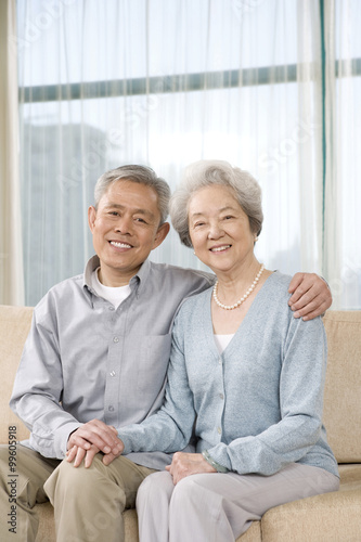 Elderly couple on couch