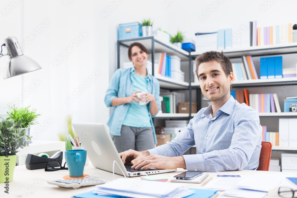 Obraz premium Two people working in the office