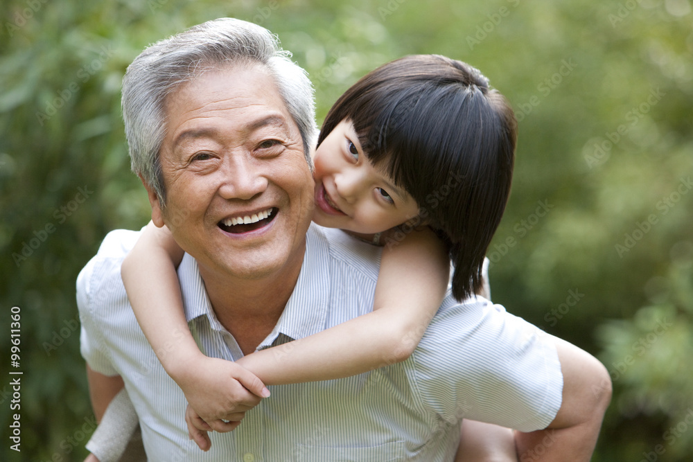 Grandpa and grandaughter having fun in garden Grandpa and grandaughter having fun in garden