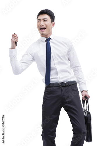 Fashionable businessman punching the air