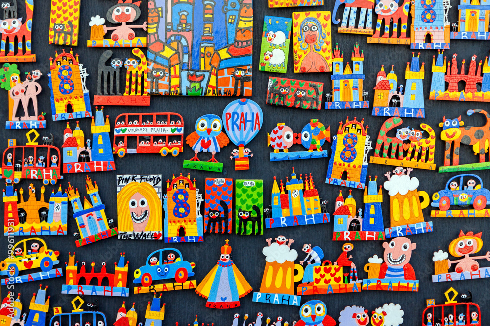 Fototapeta premium Traditional wooden colorful souvenir magnets on display in Prague, Czech Republic