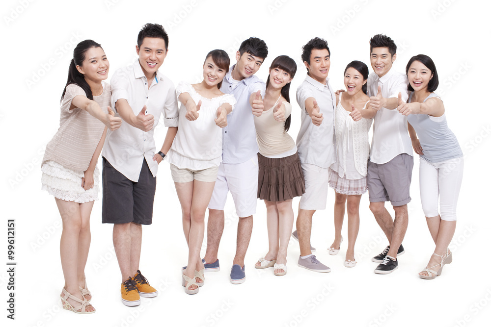 Portrait of young friends showing thumbs up