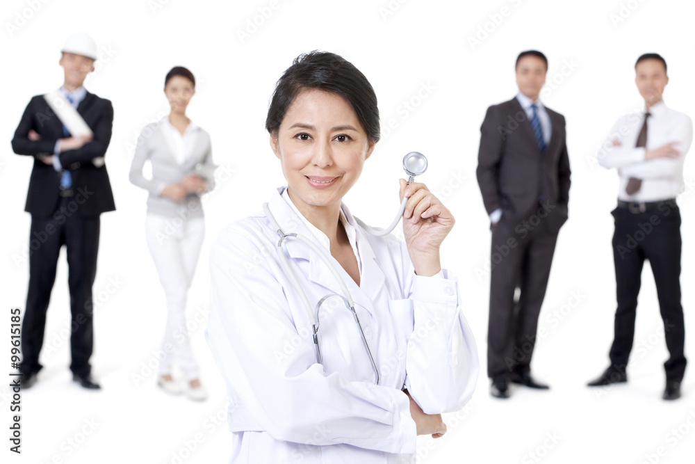 Professional female doctor with different occupation workers in background Professional female doctor with different occupation workers in background