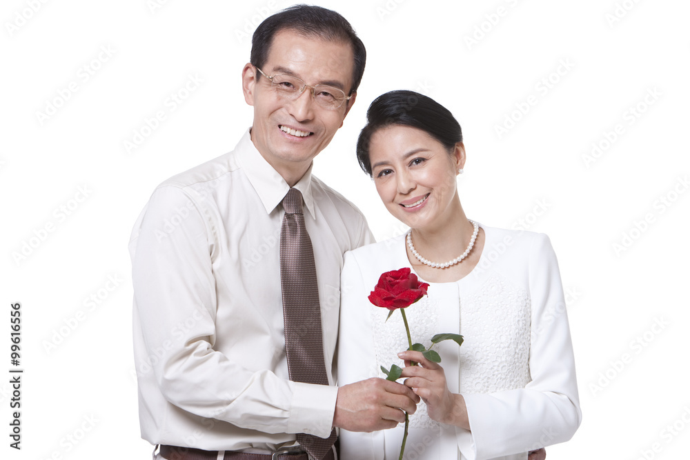 Sweet mature couple with rose