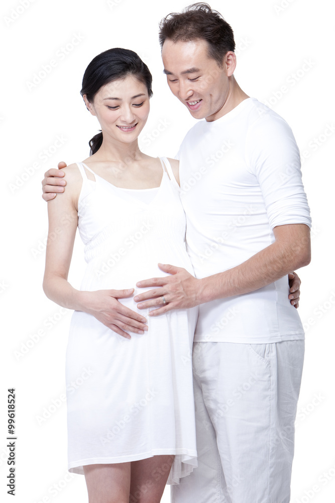 Fototapeta premium Happy young couple expecting a baby