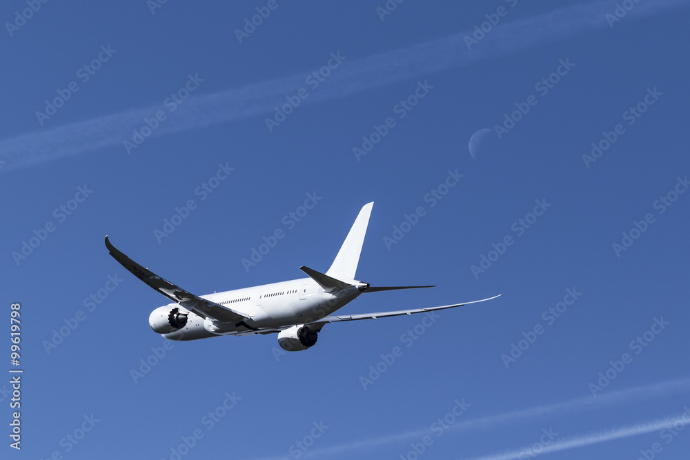 Obraz premium 月と青空と飛行機