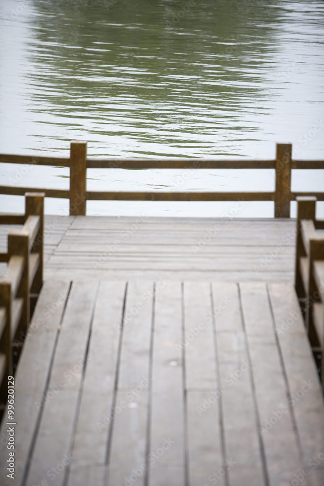 Fototapeta premium Pond and terrace in park