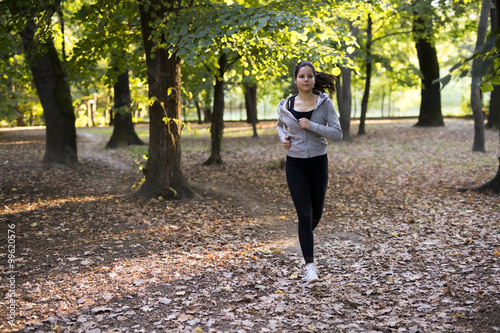 Fit woman jogging in park © NDABCREATIVITY
