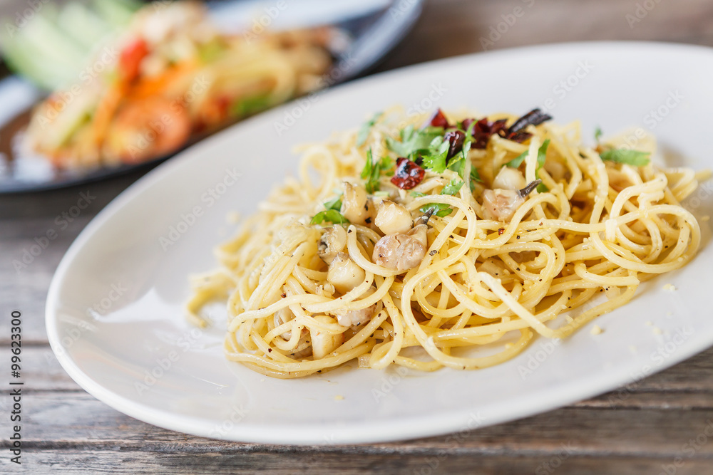 Spicy spaghetti with Spotted babylon. thai food Spicy spaghetti with Spotted babylon. thai food