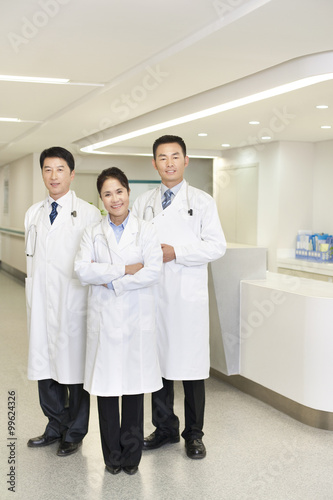 A team of smiling doctors