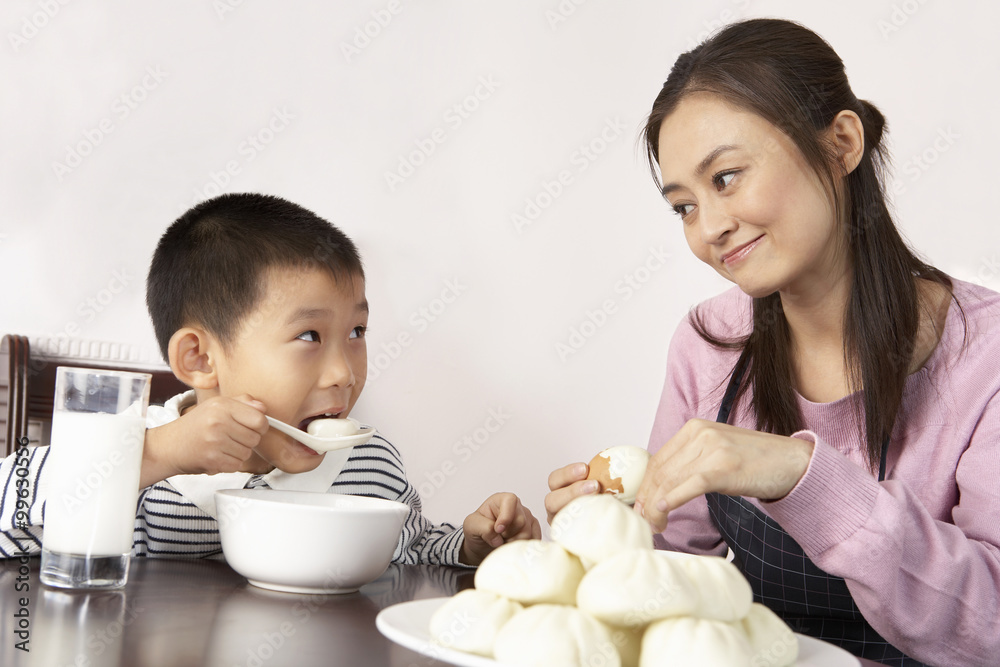Mother And Son Having A Meal Together Mother And Son Having A Meal Together