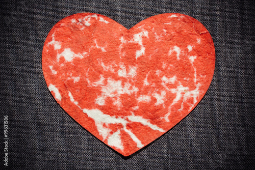 red heart on a dark wall, valentine background