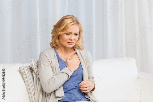 unhappy woman suffering from heartache at home