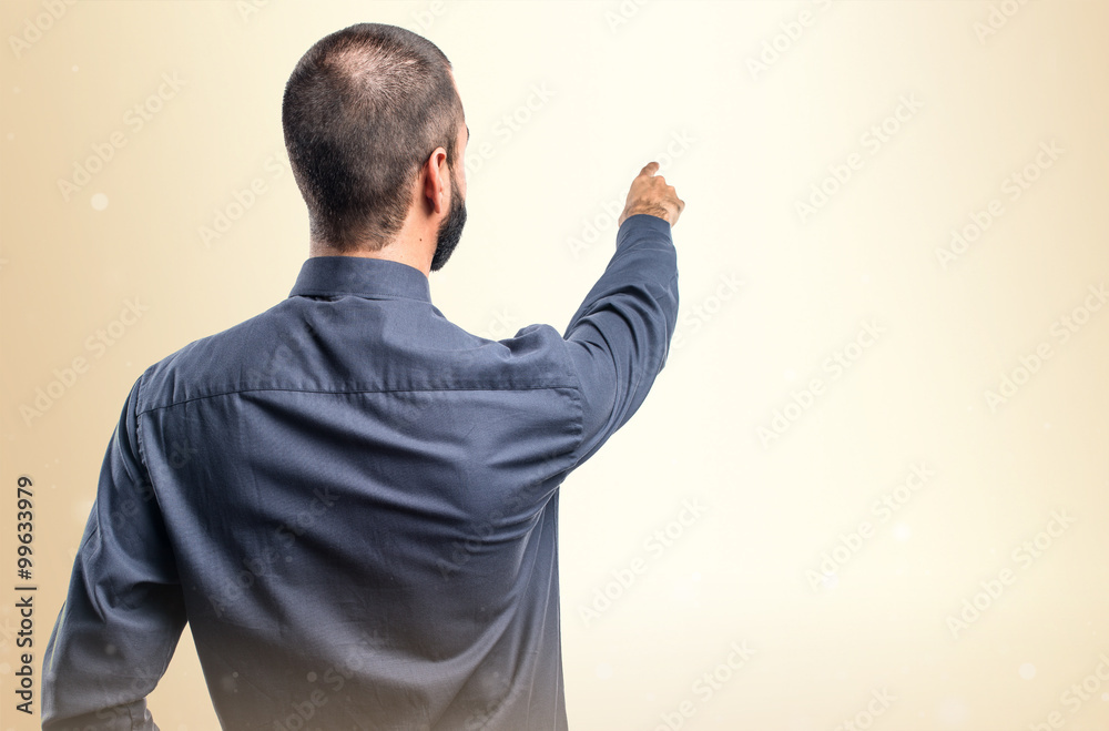 Man pointing back Man pointing back