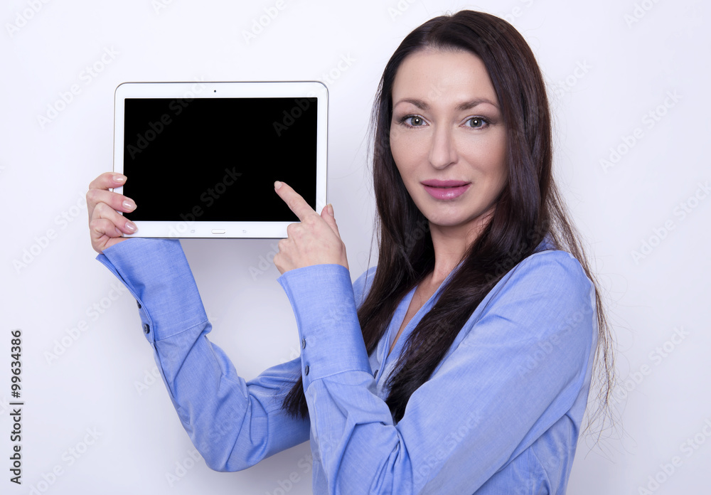 beautiful brunette business woman in working attire posing on grey background beautiful brunette business woman in working attire posing on grey background