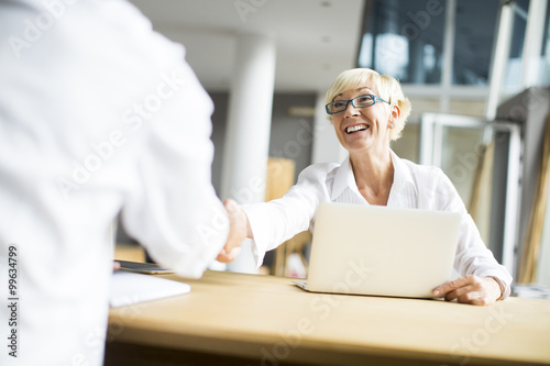 Business people shaking hands