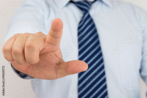 Businessman hand in pointing
