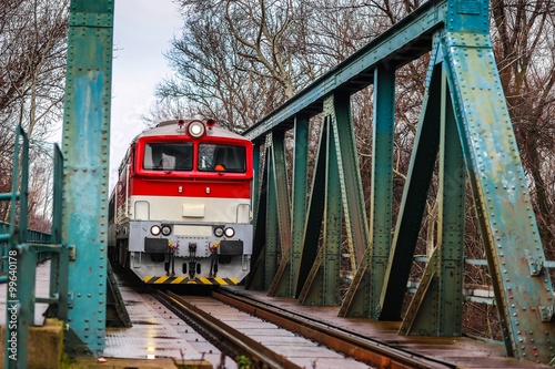 Train is coming through bridge